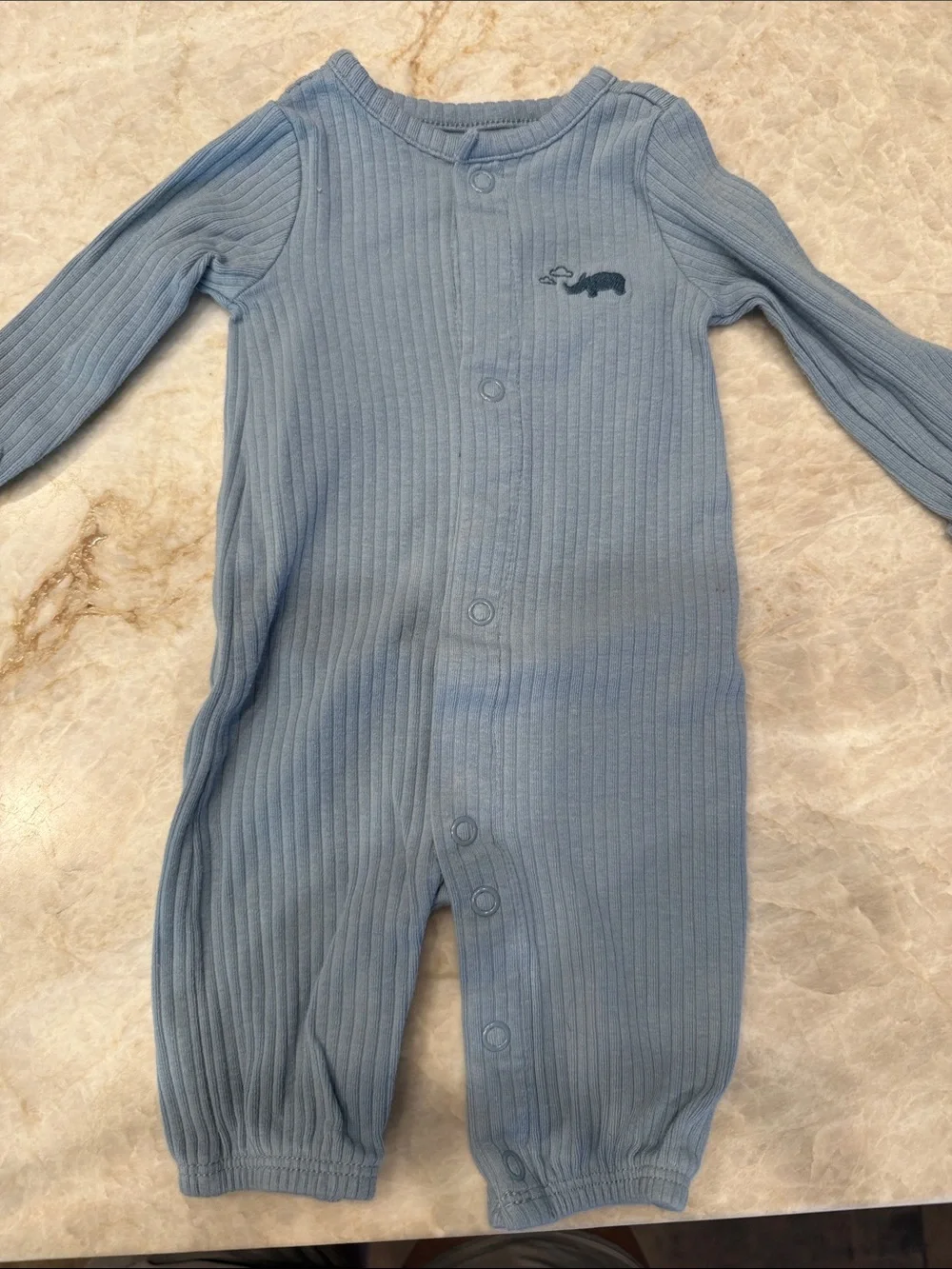 Carter’s baby clothes: 3 footie pajamas, 3 onesies newborn size